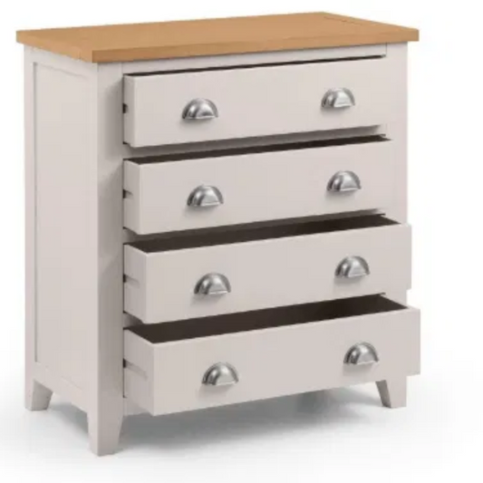 White dresser with four drawers and a wooden top on a white background