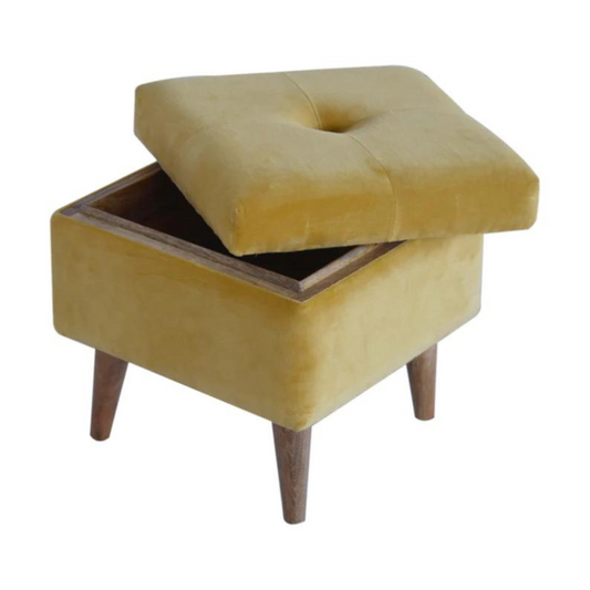 This little footstool is a elegant addition to the home. It has been upholstered in a mustard yellow cotton velvet fabric and has 4 solid wood nordic wood style legs in an oak-ish finish.  It is beautiful and versatile at the same time, it has an important feature which is the storage compartment that can be used to place things inside and save space in the home.