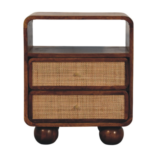 Wooden nightstand with wicker drawers on a white background