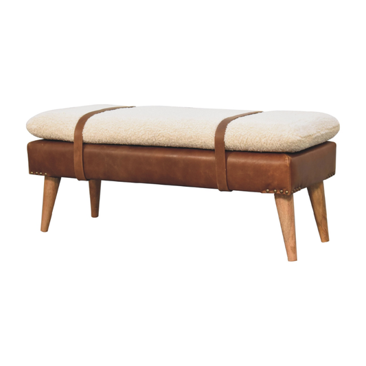 Bench with brown leather straps and white cushion on a white background