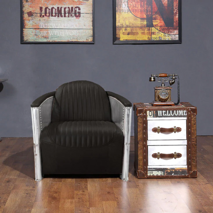 The Vintage Aviator Pilot Sofa Armchair in Black/Brown Real Leather is a stunning piece of furniture that exudes timeless elegance and captures the essence of classic aviation design. This armchair is a perfect blend of style and comfort, making it an ideal addition to any living space or office.