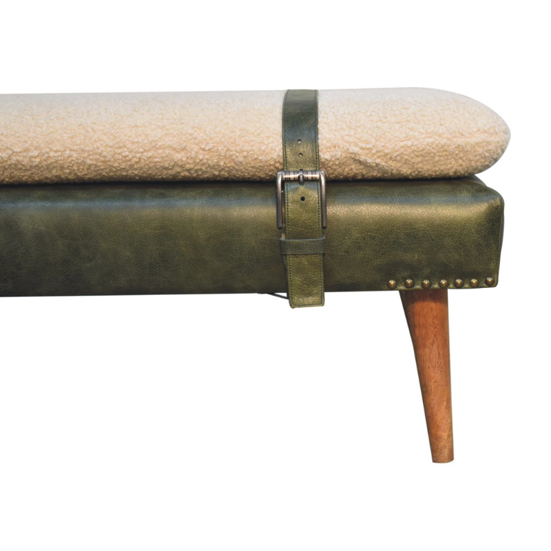 Green leather bench with beige cushion and wooden leg on a white background