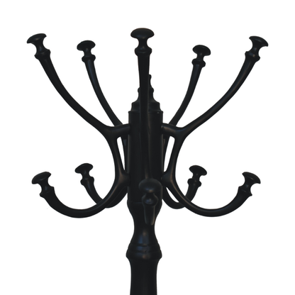 Black metal coat rack with multiple hooks on a white background