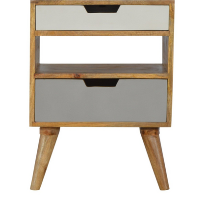 This gradient bedside has been constructed from 100% solid mango wood in an oak-ish finish and would be a perfect companion beside any bed, it stands on 4 Nordic style legs and features 2 hand painted grey and white handy drawers and 1 shelf in the middle.  It can be partnered up with the other products from the range or stand alone. A perfect addition to any home.