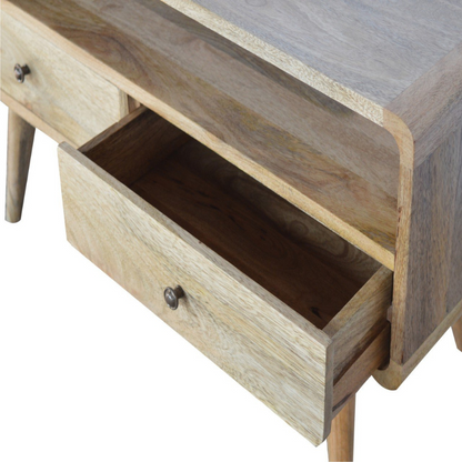 Our solid timber media unit is expertly constructed from 100% solid mango wood in a lovely oak-ish finish.  Some features include 2 drawers that come with a shiny knob, a large open slot to place any books, photo frames, ornaments, and 4 Nordic-style legs.