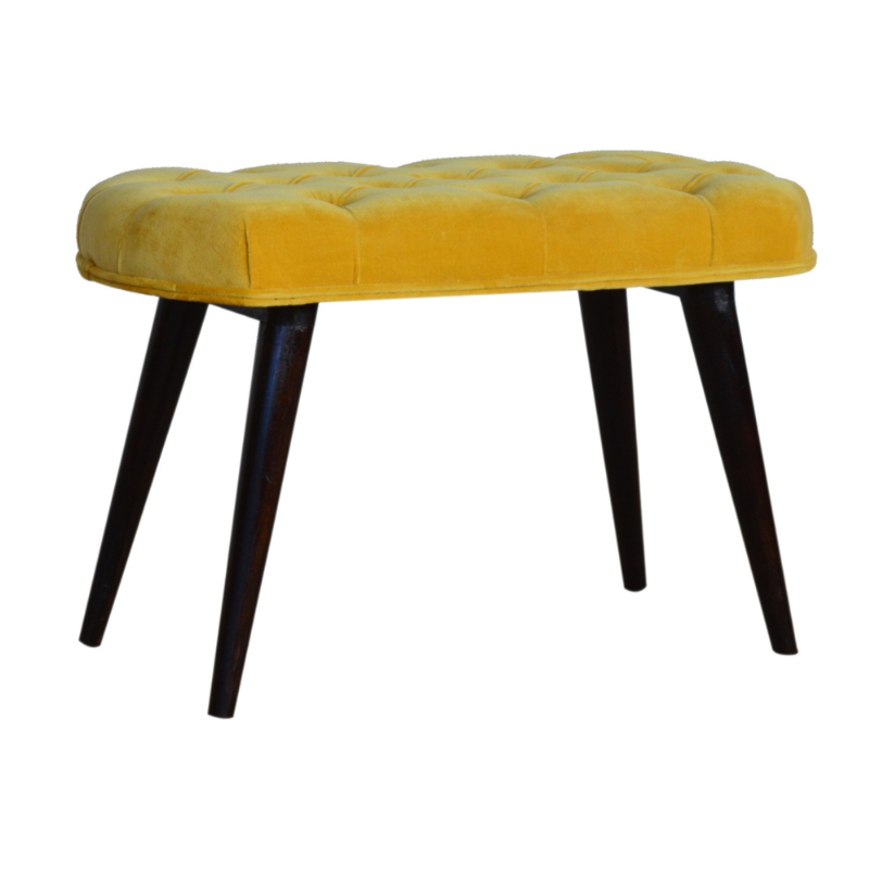 This Nordic style bench has been upholstered in a beautiful Mustard yellow cotton velvet fabric and features a classy deep-button design on the top.  The bench stands on 4 legs constructed from 100% solid mango wood in a walnut finish and it is the perfect piece to add to your bedroom or hallway as a finishing touch in the home.