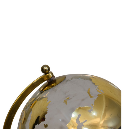 An opulent and stylish piece of decor for your home, this Decorative White Glass Globe is paired beautifully with a Gold frame to cut an impressive figure in almost any room. Highly detailed and crafted in a luxurious gold tone, this globe will look beautiful on accent tables or on the floor, helping you to decorate in style.  This product is handcrafted individually and as every piece is unique please do expect variations in finish, texture, size and should not be considered as a defect.