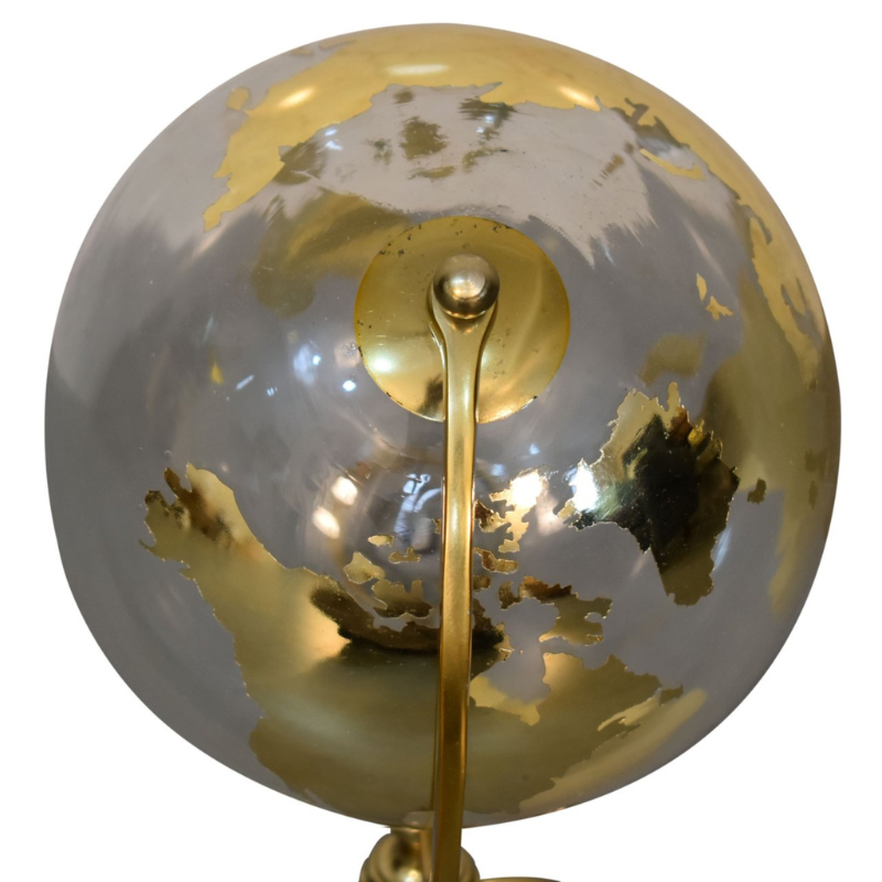 An opulent and stylish piece of decor for your home, this Decorative White Glass Globe is paired beautifully with a Gold frame to cut an impressive figure in almost any room. Highly detailed and crafted in a luxurious gold tone, this globe will look beautiful on accent tables or on the floor, helping you to decorate in style.  This product is handcrafted individually and as every piece is unique please do expect variations in finish, texture, size and should not be considered as a defect.