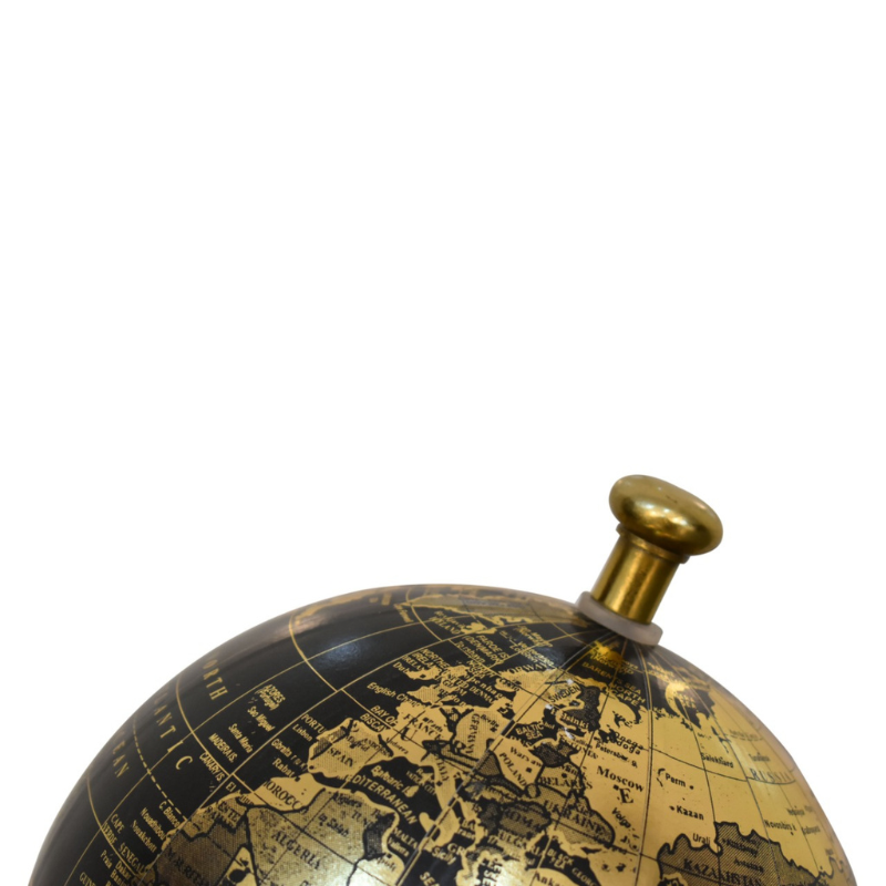 The globe is handcrafted and boasts a mixed brass and black glossy finish. The spherical globe features loose engravings, depicting the world map. The relaxed nature and style of the colours create a striking contrast between the black and brass finishes. This product is handcrafted individually and as every piece is unique please do expect variations in finish, texture, size and should not be considered as a defect.