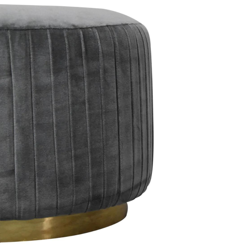 This beautiful and fashionable footstool will make the perfect addition to any bedroom or living room. It has been upholstered in a luxurious grey cotton velvet fabric with a pleated design featuring a gold brass base.  Perfect for putting your feet up, using as a handbag stand, or as an accent piece in the home.