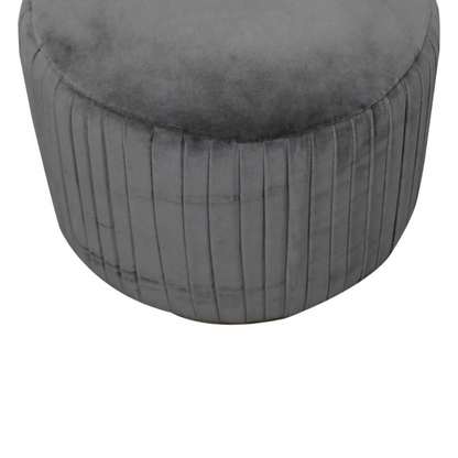 This beautiful and fashionable footstool will make the perfect addition to any bedroom or living room. It has been upholstered in a luxurious grey cotton velvet fabric with a pleated design featuring a gold brass base.  Perfect for putting your feet up, using as a handbag stand, or as an accent piece in the home.