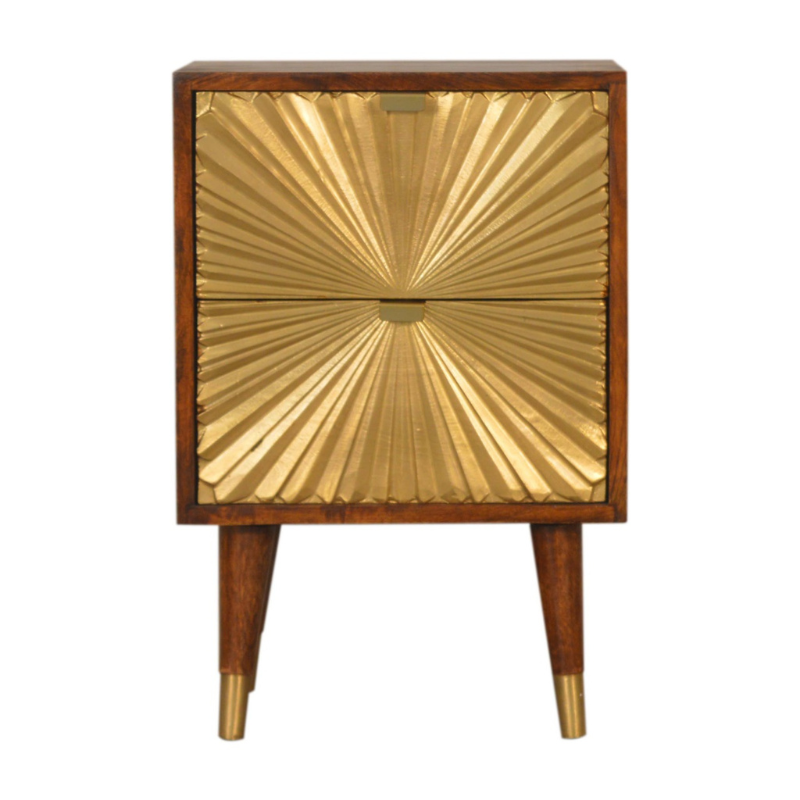 This Manila Gold Chestnut Bedside Table was designed to add a touch of elegance and charm to your bedroom. Featuring brass-plated drawers and Nordic-style brass cap feet, this piece has been constructed from 100% solid mango wood and offers a rich chestnut finish along with pull-out handles and surface space to uplift your whole bedroom look.