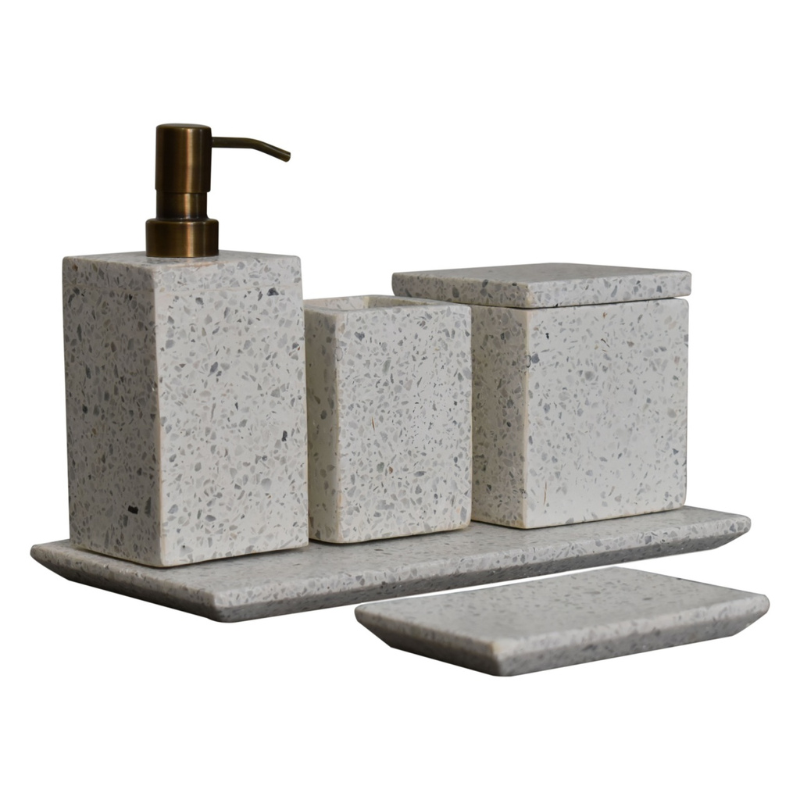 This 5-piece bathroom set is made of square polished white marble. Consists of a square soap dish, toothbrush cup, a soap dispenser with a metallic dispenser head and cosmetic box with lid. A beautiful set of accessories for your bath aswell as making a unique gift choice. Expect differences in texture, color, grains etc., as this product is extracted from a natural source. This is a natural configuration and should not be considered as a defect.