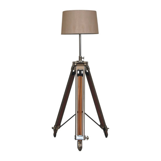 This contemporary lamp features a mixed wooden and chrome tripod design base as well as a neutral lampshade which will provide stability as well as a natural colourway and soft contrast.   It is bound to inject both a modern and rustic touch to your home décor. It also has an adjustable base so you can change the height depending on your preference.