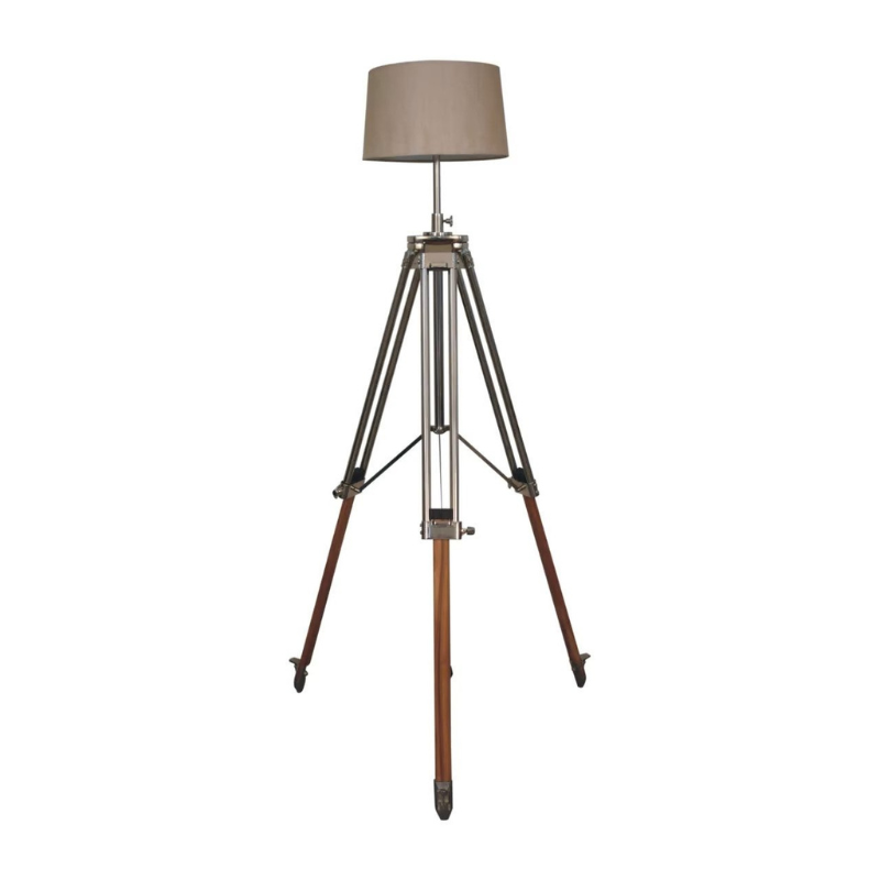 This contemporary lamp features a mixed wooden and chrome tripod design base as well as a neutral lampshade which will provide stability as well as a natural colourway and soft contrast.   It is bound to inject both a modern and rustic touch to your home décor. It also has an adjustable base so you can change the height depending on your preference.