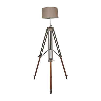 This contemporary lamp features a mixed wooden and chrome tripod design base as well as a neutral lampshade which will provide stability as well as a natural colourway and soft contrast.   It is bound to inject both a modern and rustic touch to your home décor. It also has an adjustable base so you can change the height depending on your preference.