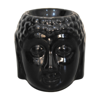 The Black Buddha Oil Burner Set is a beautiful and functional addition to any home. The intricately designed black Buddha head serves as a stylish and elegant way to enjoy the benefits of aromatherapy. The set comes complete with three delightful aroma oils in Ylang Ylang, White Lotus, and Lavender, which are known for their calming and soothing properties.