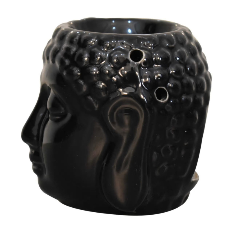 The Black Buddha Oil Burner Set is a beautiful and functional addition to any home. The intricately designed black Buddha head serves as a stylish and elegant way to enjoy the benefits of aromatherapy. The set comes complete with three delightful aroma oils in Ylang Ylang, White Lotus, and Lavender, which are known for their calming and soothing properties.