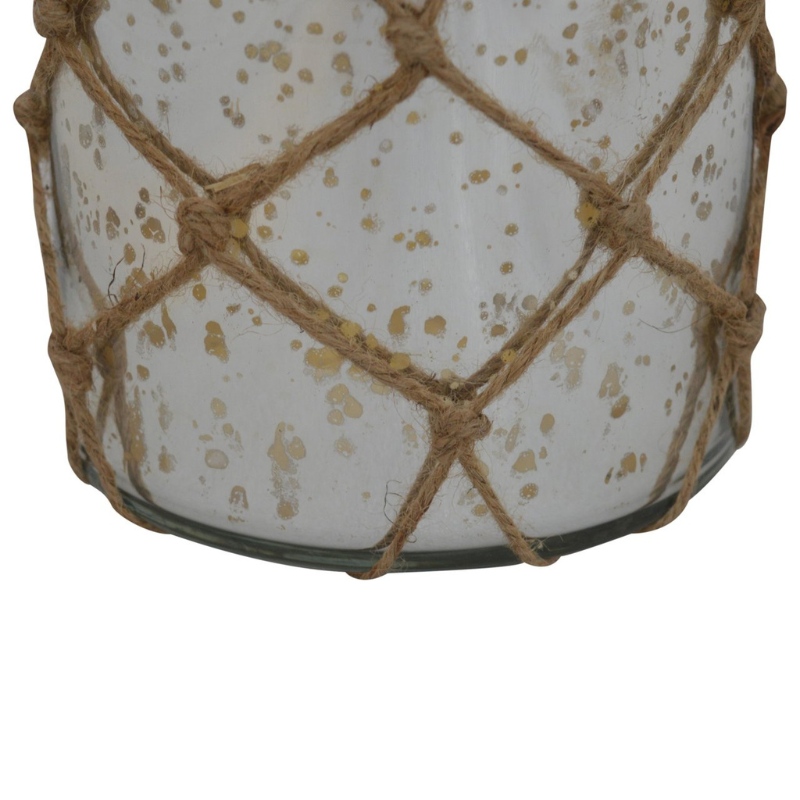 This small jar lantern has been made from vintage glass in an antiqued mercury finish. Update your home decor by displaying this piece using the rope that it comes with which has a natural fiber hanging loop.  It can be used as an accessory or be gifted to family and friends.