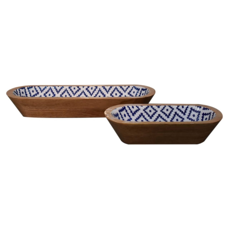 Beautifully crafted from solid Mango Wood, this beautiful oblong bowl set is bound to wow your guests. With natural Mango Wood grain detailing externally and internal lacquered black and white aztec patternings , the style and contrast of the design and wood finish really allow the natural beauty of materials to shine.