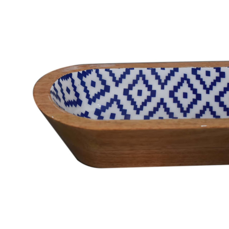 Beautifully crafted from solid Mango Wood, this beautiful oblong bowl set is bound to wow your guests. With natural Mango Wood grain detailing externally and internal lacquered black and white aztec patternings , the style and contrast of the design and wood finish really allow the natural beauty of materials to shine.