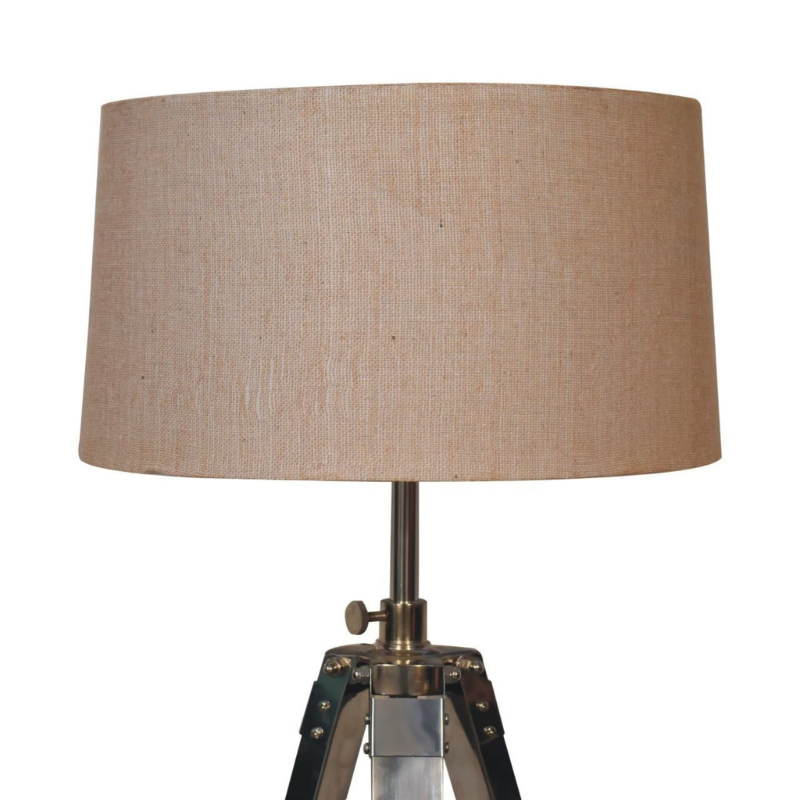 This contemporary floor lamp features a chrome tripod design base as well as a neutral lampshade which will provide stability as well as a natural colourway and soft contrast. It is bound to inject both a modern and rustic touch to your home décor. It also has an adjustable base so you can change the height depending on your preference.