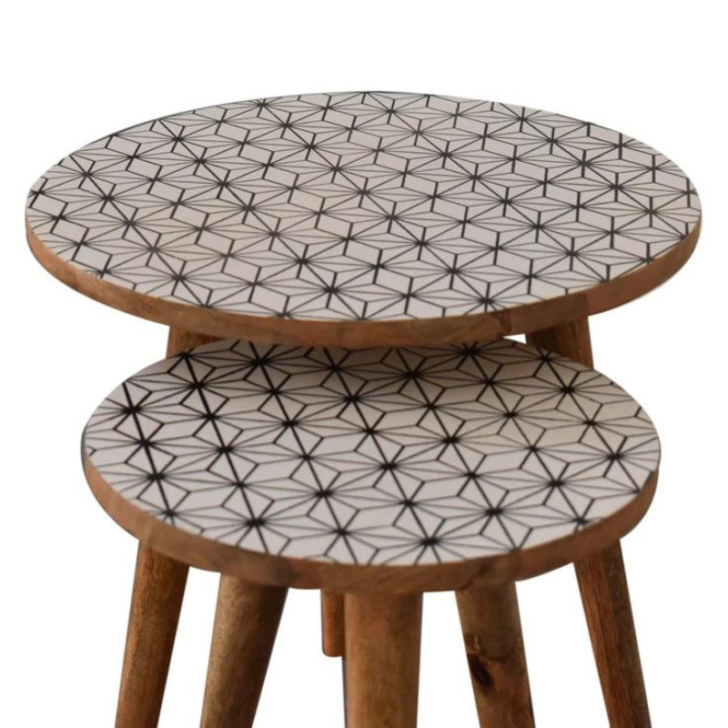 This set of 2 Nordic style round stools are made of 100% mango wood in an oak-ish finish and are perfect for seating for guests or for everyday use. The stools also work as side tables, providing excellent versatility with their compact size.  They are perfect for use in small spaces and can be tucked away under one another partially.