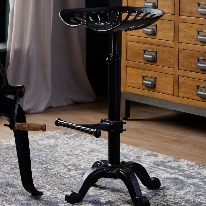 This is the Adjustable Tractor Seat, a perfectly practical and stylish addition of seating to inject personality into any interior whether it be a home, bar, hotel or venue. The stool is able to adjust in height while the seat has been shaped to ensure it is comfortable too.  The use the black metal gives a bold industrial feel that can be complemented with a range of other furnishings and style to create the ideal look.