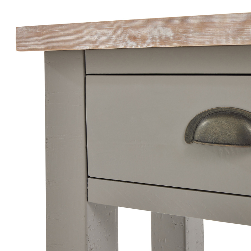 The Oxley Collection Two Drawer Console Table is perfect for display as well as storage. A washed wood plank surface blended with a body in a warm grey hue deliver a relaxed, informal feel to any space. Stylish as well as functional, this high quality item would be equally at home in traditional and contemporary styled spaces. Style with a large mirror or art piece above to really highlight its beauty. Perfect for a hallway but could also be put to use in the bedroom as a dressing table.