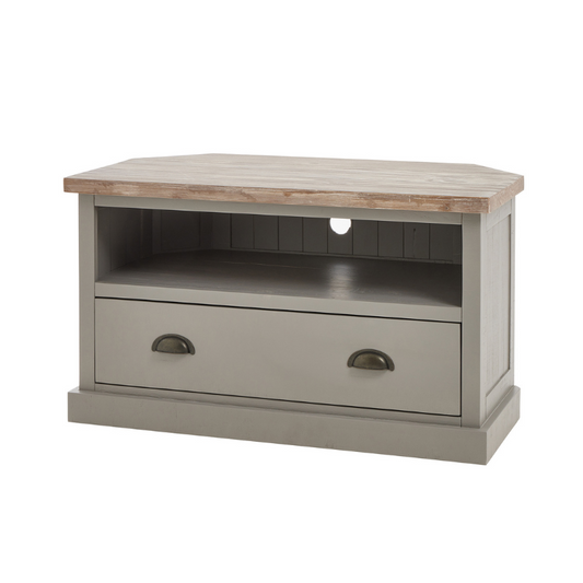 The Oxley Collection TV Unit boasts a useful drawer and shelf, circular hole to manage unsightly wires and corner-friendly shape. Its features are all designed to help keep its washed wood surface clutter free and provide the space required for modern home entertainment essentials. Stylish as well as functional, this side table would be equally at home centre stage in a room as tucked into a corner.