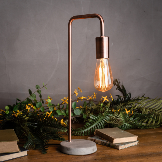 This is the Copper Industrial Lamp With Stone Base, a contemporary item of lighting that is on trend and stylish.  The copper combined with stone brings an element of industrial style to this piece, at 47cm high and 16.5cm wide it is an ideal size and would make a perfect addition to any lighting collection. E27 Screw Bulb