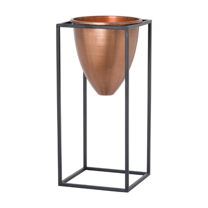 This is the Large Copper Bullet Planter On Black Frame, a unique and contemporary planter in style and features which is sure to bring an element of design and class into any interior.