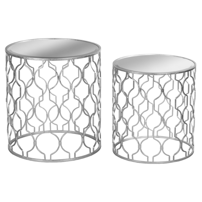 This is the Set of Two Arabesque Silver Foil Mirrored Side Tables. This pair would look great together or placed separately, built from metal with a silver finish this item has been inspired by an arabesque design consisting of flowing lines, the use of the mirrored glass also adds an instant touch of glamour.  Team with the the Arabesque designed mirror (18779) for a great match.