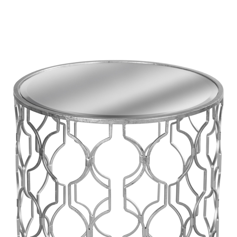 This is the Set of Two Arabesque Silver Foil Mirrored Side Tables. This pair would look great together or placed separately, built from metal with a silver finish this item has been inspired by an arabesque design consisting of flowing lines, the use of the mirrored glass also adds an instant touch of glamour.  Team with the the Arabesque designed mirror (18779) for a great match.