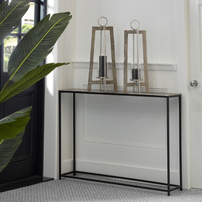 This is the Farrah Collection Silver Console Table. Hand cast in aluminium, the casting process lends this piece a pitted, textured surface which is both eye-catching and hardwearing. Designed with versatility of use in mind, the Farrah furniture collection comprises sturdy pieces which are also light enough to move around your home.