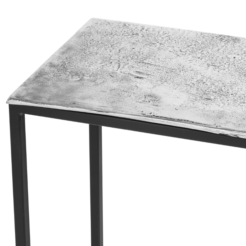 This is the Farrah Collection Silver Console Table. Hand cast in aluminium, the casting process lends this piece a pitted, textured surface which is both eye-catching and hardwearing. Designed with versatility of use in mind, the Farrah furniture collection comprises sturdy pieces which are also light enough to move around your home.