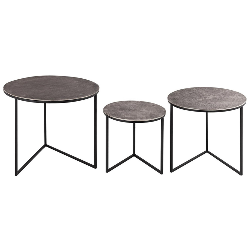 This is the Farrah Collection Set of Three Rounds Tables. Hand cast in aluminium, the casting process lends these pieces pitted, textured surfaces which are both eye-catching and hardwearing. Designed with versatility of use in mind, this collection comprises sturdy pieces which are also light enough to move around your home.