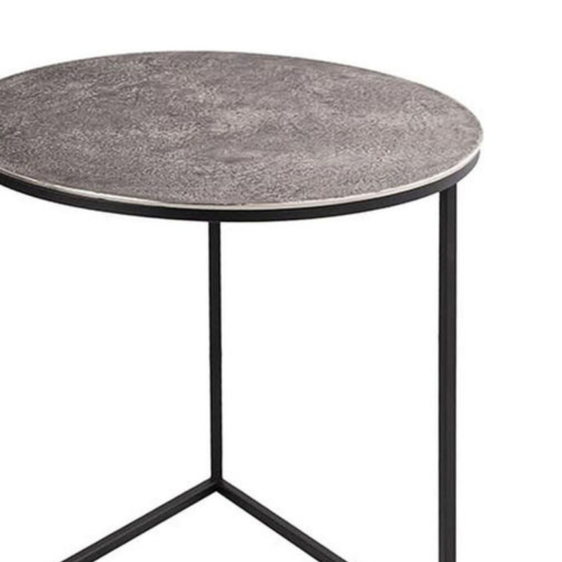 This is the Farrah Collection Set of Three Rounds Tables. Hand cast in aluminium, the casting process lends these pieces pitted, textured surfaces which are both eye-catching and hardwearing. Designed with versatility of use in mind, this collection comprises sturdy pieces which are also light enough to move around your home.