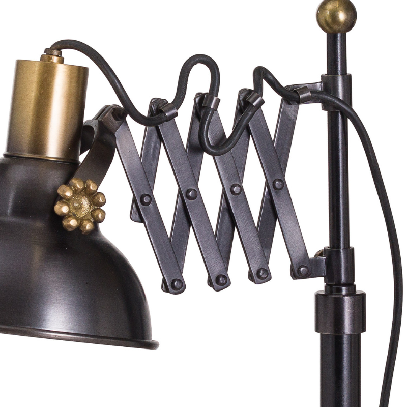 This is the Black and Brass Industrial Scissor Lamp. Crafted in iron with an eye-catching scissor adjustment, this lamp's contrasting colourway gives it the stand-out to turn heads and close sales. Equally appealing to those with a taste for industrial decor as an art deco colour palette. This item takes the universally available E27 large screw bulb.