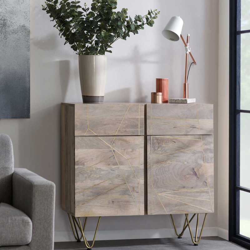 Medium sized sideboard with 2 drawers and 2 doors, with one interior shelf behind each door. The perfect addition to your dining room, providing plenty of storage space. This range is offered in a light natural finish, featuring gold metal inlays on the front of the unit.  Drawer dimensions (HxWxD): 13x35x30 cm Cupboard dimensions (HxWxD): 28x42x32 cm upper shelf 22x42x34 cm lower shelf