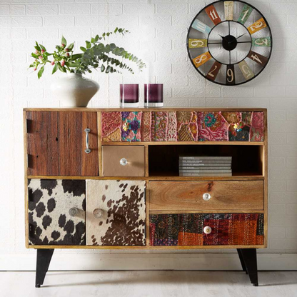 Hand crafted by Skilled craftsmen. This range offers a new dimension to furniture making from 100 % Reclaimed Wood. Featuring 8 different size storage areas along with the top for photos, lamps, flowers etc you will find it extremely useful anywhere in your home. Each drawer is covered with a different material which makes each product unique, finished with traditional handles and knobs.