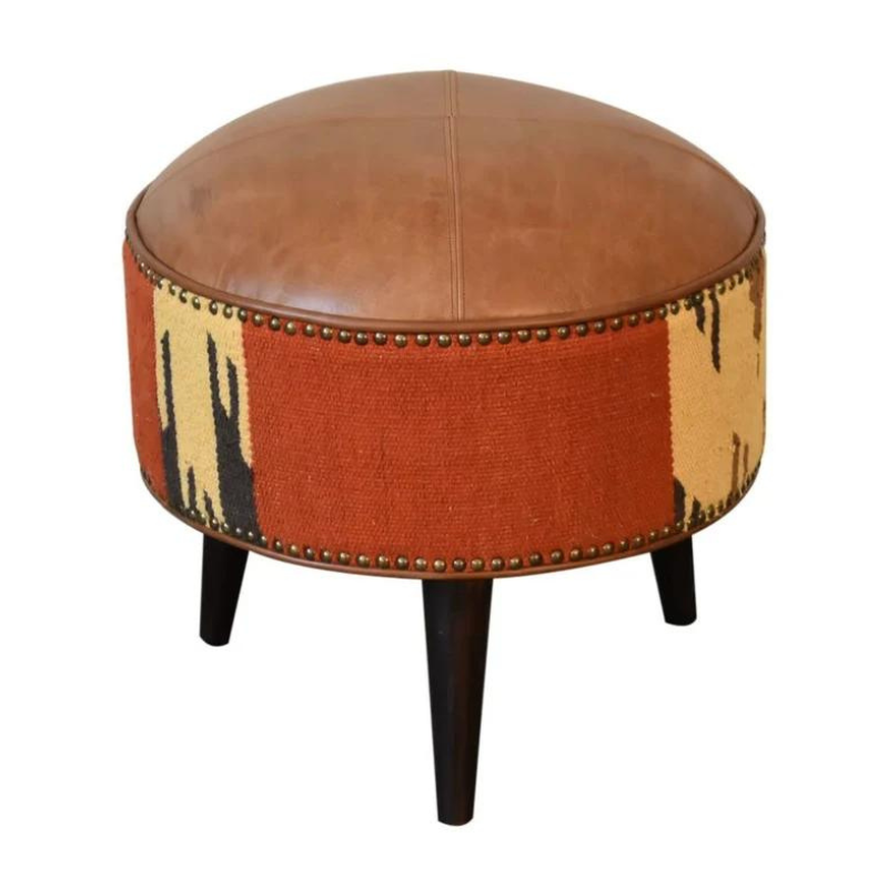 Introduce a playful piece to your interiors with this mixed footstool.  Combining both buffalo leather and durrie prints, it has nordic style legs in a dark walnut finish and it is the perfect piece to use in the living room with its compact size, making it ideal for extra seating for guests or as a footrest.