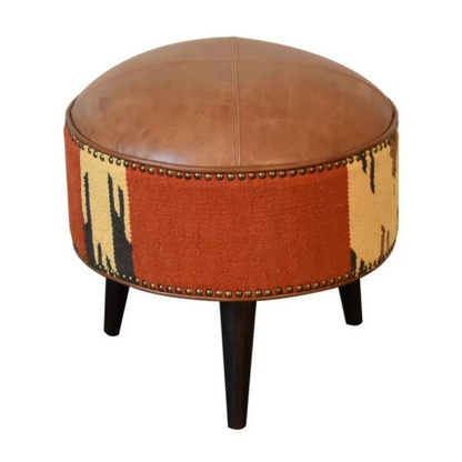 Introduce a playful piece to your interiors with this mixed footstool.  Combining both buffalo leather and durrie prints, it has nordic style legs in a dark walnut finish and it is the perfect piece to use in the living room with its compact size, making it ideal for extra seating for guests or as a footrest.