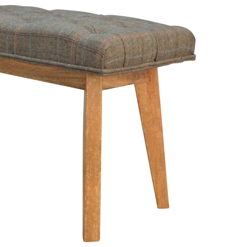 This bench is ideal for extra seating, and is constructed from 100% solid mango wood, and upholstered in multi tweed. Other features include deep button tufts and 4 Nordic-style legs which have a smooth oak-ish finish.  You may encounter variations from batch to batch hence if you are looking to pair products under similar room settings; you can opt for a bespoke order or take an informed decision about the possible variations.