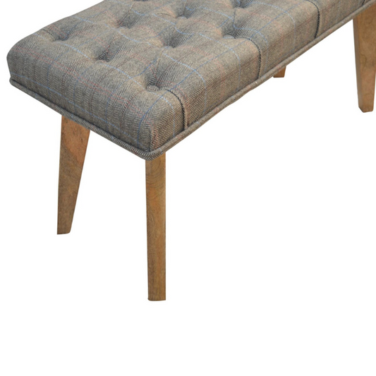 This bench is ideal for extra seating, and is constructed from 100% solid mango wood, and upholstered in multi tweed. Other features include deep button tufts and 4 Nordic-style legs which have a smooth oak-ish finish.  You may encounter variations from batch to batch hence if you are looking to pair products under similar room settings; you can opt for a bespoke order or take an informed decision about the possible variations.