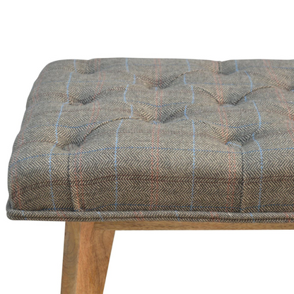 This bench is ideal for extra seating, and is constructed from 100% solid mango wood, and upholstered in multi tweed. Other features include deep button tufts and 4 Nordic-style legs which have a smooth oak-ish finish.  You may encounter variations from batch to batch hence if you are looking to pair products under similar room settings; you can opt for a bespoke order or take an informed decision about the possible variations.