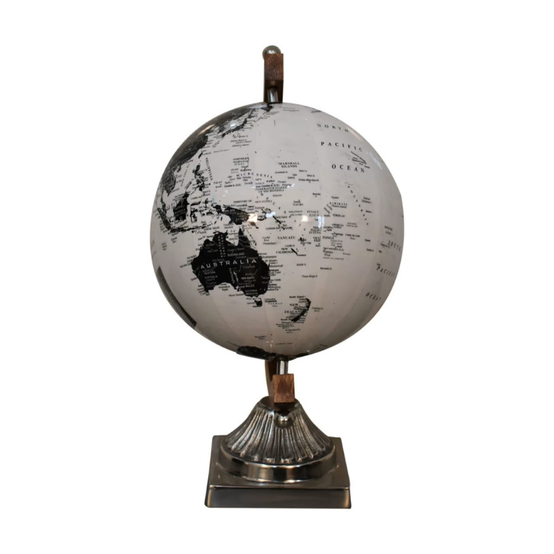 The wooden framed globe boasts a lovely white and black glossy finish. The spherical globe features loose engravings, depicting the world map. The relaxed nature and style of the design creates a striking contrast with the chrome frame.  This product is handcrafted individually and as every piece is unique please do expect variations in finish, texture, size and should not be considered as a defect.