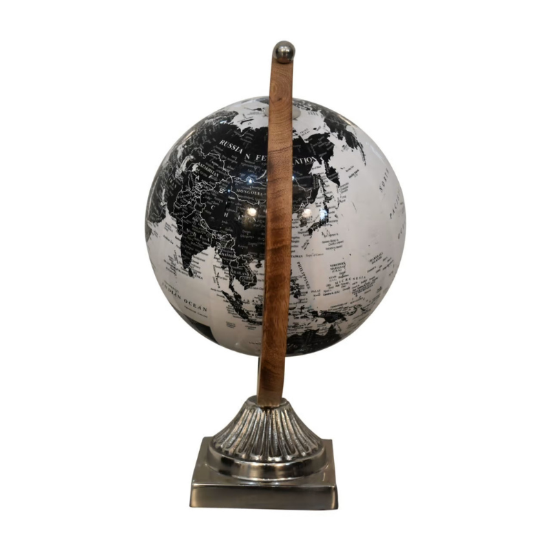 The wooden framed globe boasts a lovely white and black glossy finish. The spherical globe features loose engravings, depicting the world map. The relaxed nature and style of the design creates a striking contrast with the chrome frame.  This product is handcrafted individually and as every piece is unique please do expect variations in finish, texture, size and should not be considered as a defect.