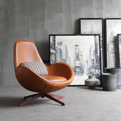 Introducing the Snail Armchair, Brown Leather - a perfect blend of comfort, style, and contemporary design. Crafted with high-quality leather, sturdy steel frame, and high-density foam padding, this armchair is built to provide exceptional durability and long-lasting comfort.