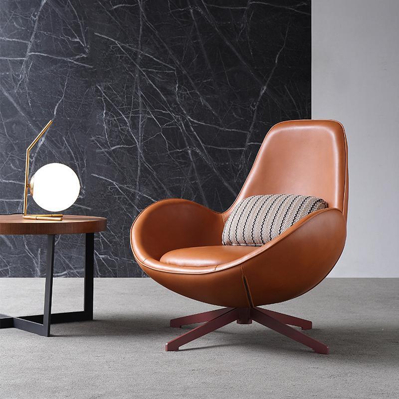 Introducing the Snail Armchair, Brown Leather - a perfect blend of comfort, style, and contemporary design. Crafted with high-quality leather, sturdy steel frame, and high-density foam padding, this armchair is built to provide exceptional durability and long-lasting comfort.